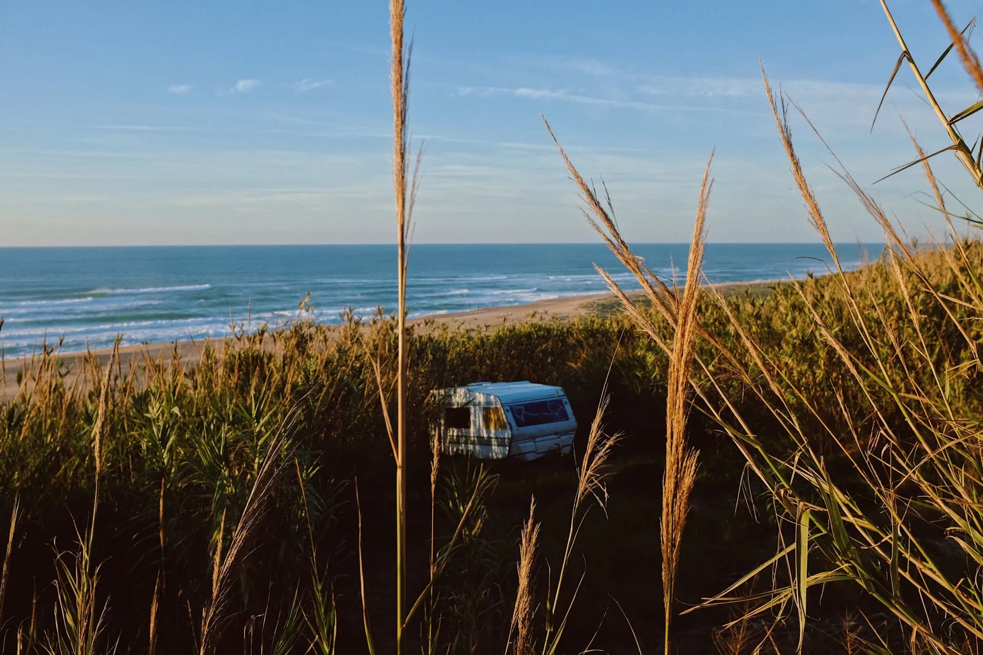 Camper in the dunes by the sea